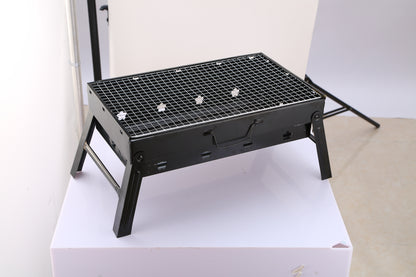 Fold‑Flat Charcoal Grill with Lid, Ventilation & Carry Handle